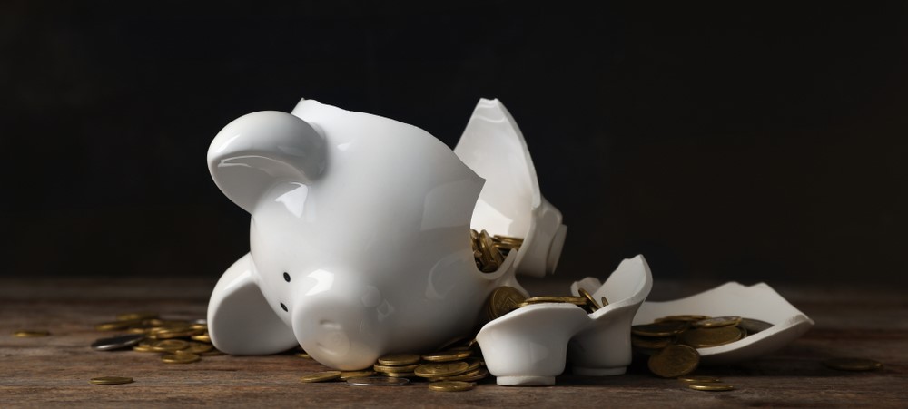 broken white piggy bank